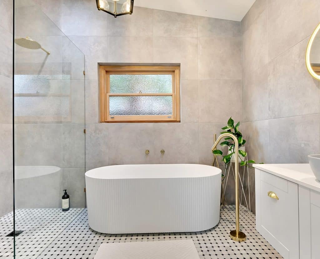 Designer bathroom with freestanding tub in Melbourne